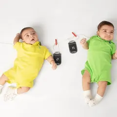 Double the love. This creative newborn portrait of twins is a whimsical way to announce their arrival. I love designing unique concepts like this to tell each family's special story.