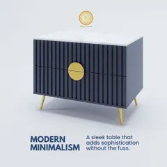 An example of modern minimalism, this sleek console table features a ribbed texture, a marble top, and a striking central gold handle. It adds a touch of sophistication without any fuss.