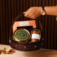 Our Rakhi gift basket is designed to be a complete sensory experience. This hamper features a mix of our popular treats like brownies and granola, all nestled in a stylish and sturdy basket that makes a statement.