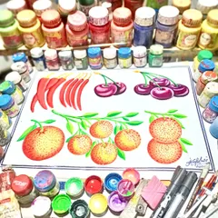 A colorful still life painting of chilies, cherries, and oranges, surrounded by my bottles of paint. This shows the vibrant palette I work with.