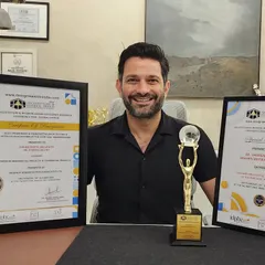 Here I am with the awards for "Visionary Architect & Interior Designer of the Year" and "Most Prominent & Trendsetter Firm." These accolades are a wonderful recognition of the hard work and passion my team and I pour into every project.