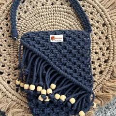 The same stylish handbag design, this time in a classic navy blue. You can order your favorite color, and I'll craft it just for you.