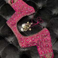 Personalized perfection is my promise. This custom-made pink blouse, meticulously embroidered with intricate geometric and floral patterns, is designed to elevate your style.