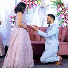 Down on one knee, a timeless gesture of love. We make sure to capture this pivotal moment of the ring ceremony from a perspective that includes the beautiful decor and the couple's emotions.