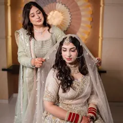 The final touches from a loving mother before the Anand Karaj ceremony. These are the moments that make a wedding day so memorable.