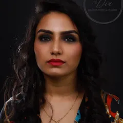 This is a powerful, direct look at a finished classic smoky eye. Notice how the blending creates depth and intensity, making the eyes the center of attention. This is a must-have skill for any makeup artist.