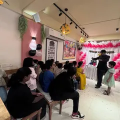 Performing for a group of kids at a birthday party held in a Bangalore cafe. My act is flexible and can be set up in various venues, ensuring great entertainment wherever you choose to celebrate.
