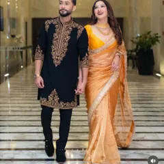 Confidence in motion. A full-length view of the custom-fitted black sherwani, designed to look impeccable from every angle as you walk through your special day.