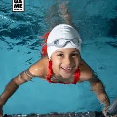 Look at that smile! This is what pure joy in the water looks like. Our swimming program for kids focuses on building confidence and having fun, one happy splash at a time.
