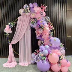 A romantic and dreamy ring backdrop for an engagement or bridal shower. I used a mix of pastel pink and lavender balloons, intertwined with flowers and a soft pink drape for an elegant photo corner.