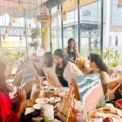 "We cannot believe we spent 2 hours without our phones!" That's the magic of being present and creative. A beautiful, sunlit workshop in a lovely cafe.