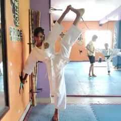 Flexibility is a key component of our training. This young student shows incredible dedication.