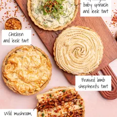 Our savory tarts are pure comfort, made with the flakiest crusts and richest fillings. Here you can see the variety we offer, including the Wild Mushroom with caramelized onion and brie, a creamy Asparagus, baby spinach and leek tart, and a hearty Braised Lamb Shepherd's tart.