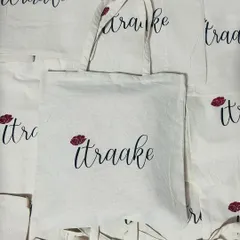 A simple, elegant tote bag is a powerful branding tool. This custom printed cotton tote for 'itraake' shows how a clean design can make a big impact, creating a reusable bag customers will love to carry.