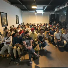 A wide shot of the audience during one of my photography workshops. It's always inspiring to see so many people eager to learn and improve their craft. The questions and interactions are a valuable part of the learning process for everyone.