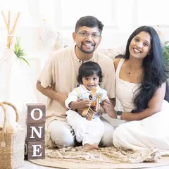 I believe in capturing the whole family's love. This beautiful family portrait was part of a boho-themed first birthday shoot, showing the connection and happiness surrounding the little one.