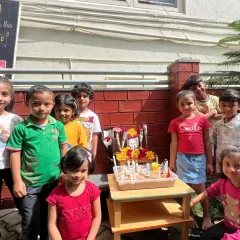 Our children celebrating the birthday of Dr. Maria Montessori. By lighting candles and sharing flowers, they pay tribute to the visionary who discovered this wonderful path of learning, exploration, and self-discovery.