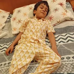 This little one looks so cozy and ready for bed in our yellow Giraffe print pyjama set. It’s one of our most requested animal prints for kids.