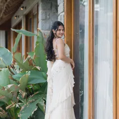 A full-length view of the minimal and classy look, perfect for a cousin's wedding.