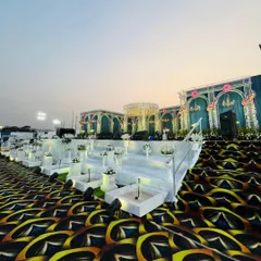 A breathtaking view of a grand reception stage I designed. Notice the multi-level platform, integrated water features, and the striking custom carpet that all come together to create an unforgettable backdrop for a special day.
