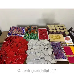 The sheer variety of treats I prepare for Diwali. This table is laden with edible firecrackers, chocolate coins, and other themed goodies for my hamper orders.