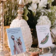 "No points for guessing Sahil's favourite alcohol." These playful, meme-inspired cards placed on tables shared fun facts and inside jokes about the couple.