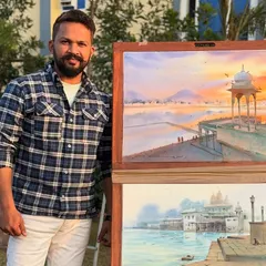 With my two paintings from the National Artist camp in Ajmer. The top one is the Pushkar ghat, and the one below is another on location work.