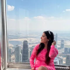 Another shot from the top of the Burj Khalifa. The bright pink of my dress stood out beautifully against the blue sky and the cityscape.