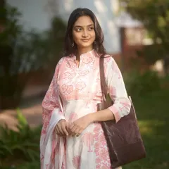 This is a perfect example of a daytime look for an ethnic wear brand. I created a clean base, groomed brows, and a neutral lip, ensuring the model looks polished and relatable for the everyday-wear collection.