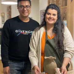 This couple celebrated an anniversary by creating a beautiful clay vase and sculpture together. It's a wonderful way to collaborate on a keepsake for your home.