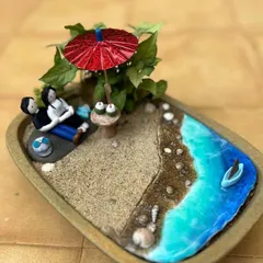 Imagine a peaceful evening by the sea, captured in a tiny tray garden. I create these complete miniature scenes so you can hold a perfect moment in your hands or give it to someone you love.