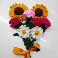 A bright and cheerful mixed flower bouquet featuring two sunflowers, daisies, carnations, and tulips. This arrangement is a burst of color and joy, perfect for any celebration.