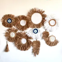A beautiful boho wall arrangement featuring my Evil Eye hangings mixed with other raffia and macramé pieces. You can buy them individually or create your own custom combo.
