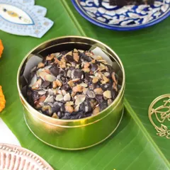 My Ragi Chocolate Walnut Tea Cake, packed in its reusable tin. This 500gm cake is a popular choice for those looking for a healthier, gluten-free dessert option.