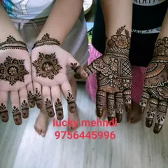 Here are some options for guest mehndi. On the left, a simple and pretty mandala design for a younger guest, and on the right, a more filled-in floral design for an adult.