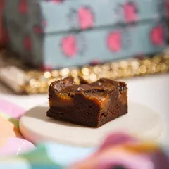 A perfect square of our gooey, rich salted caramel brownie. The fudgy texture and deep chocolate flavor make this an all-time favorite.