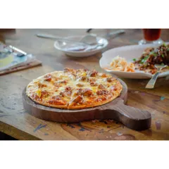 I believe in making food that brings joy, like this perfectly baked pizza with generous toppings and melted cheese. It's a favorite among our regulars and a great dish to share with friends while you get creative.