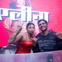 Another moment from the NYE party, capturing the fun and celebratory atmosphere behind the DJ booth.