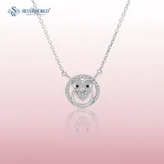 A symbol of midnight wisdom, this Owl Necklace is artfully crafted in 925 silver. The design features a circular frame studded with Zirconia, with a wise owl and a heart at its center.