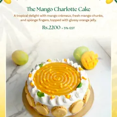 The Mango Charlotte Cake is an elegant dessert featuring mango crèmeux, fresh mango chunks, and sponge fingers, all topped with a glossy orange jelly. It's available as a full cake from my Mango Menu.