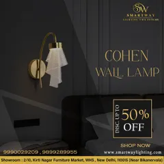 The Cohen Wall Lamp features a delicate, draped mesh shade that creates a soft and romantic light. It's a beautiful addition to a classic or transitional bedroom.