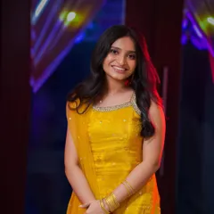 This guest is ready for her sister's engagement in a vibrant yellow suit. I did both her hair and makeup, creating a minimal glam look with soft waves that is perfect for a siders look.