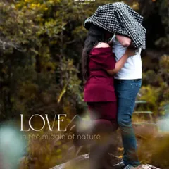A stolen, intimate moment under a jacket, hidden away in nature. This creative shot is all about privacy and connection, creating a feeling that the world has faded away and only they exist.