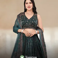 Taurus, you appreciate luxury and elegance. This deep green lehenga with intricate embroidery speaks to your love for timeless beauty.