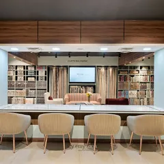 For this expansive home furnishings store, the goal was to create an intuitive and inspiring customer journey. The central consultation desk, flanked by curated art and fabric libraries, acts as the heart of the showroom, inviting clients to explore and collaborate on their designs.