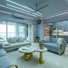 There’s something about this space that makes you want to sit down and exhale. Rich blue tones, soft lighting, and luxurious textures do all the talking in this SNN Clermont living room.