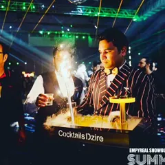 A tray of smoky cocktails ready to be served. We use dry ice and smoke guns to create a dramatic fog effect that rolls over the drinks and onto the table.
