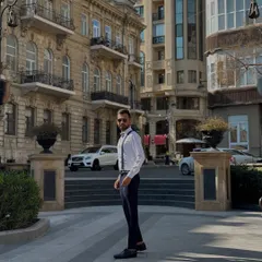 Another shot of my 'captain' look on the streets of Baku. I believe in going the extra mile to fit the theme, even if it's for guiding guests on a party bus.