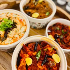 A spread of our popular South Indian dishes. This meal featured our flavourful Prawn Ghee Roast, Chicken Chettinad, and comforting Curd Rice, all made with freshly ground spices.
