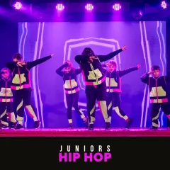 A dynamic pose from our juniors hip hop performance. The glow-in-the-dark elements on their costumes added a cool, futuristic vibe to the act.
